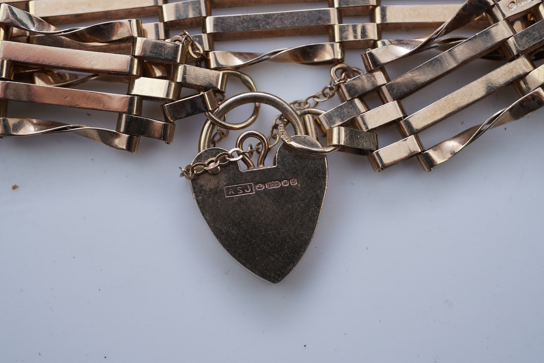 Two gold bracelets and a gold watch